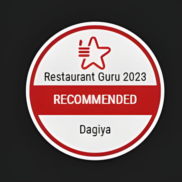 Restaurant Guru 2023 Recommended badge for Dagiya, a Korean restaurant, on a black background.